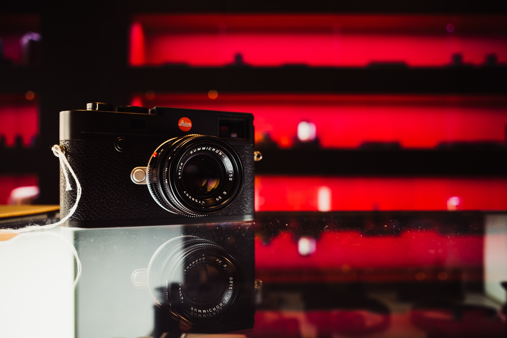 Sam Bloomberg-Rissman, product leader and photographer, with professional camera equipment